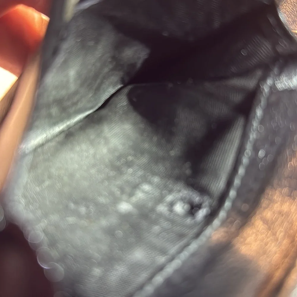 Salvador Ferragamo black bifold wallet.